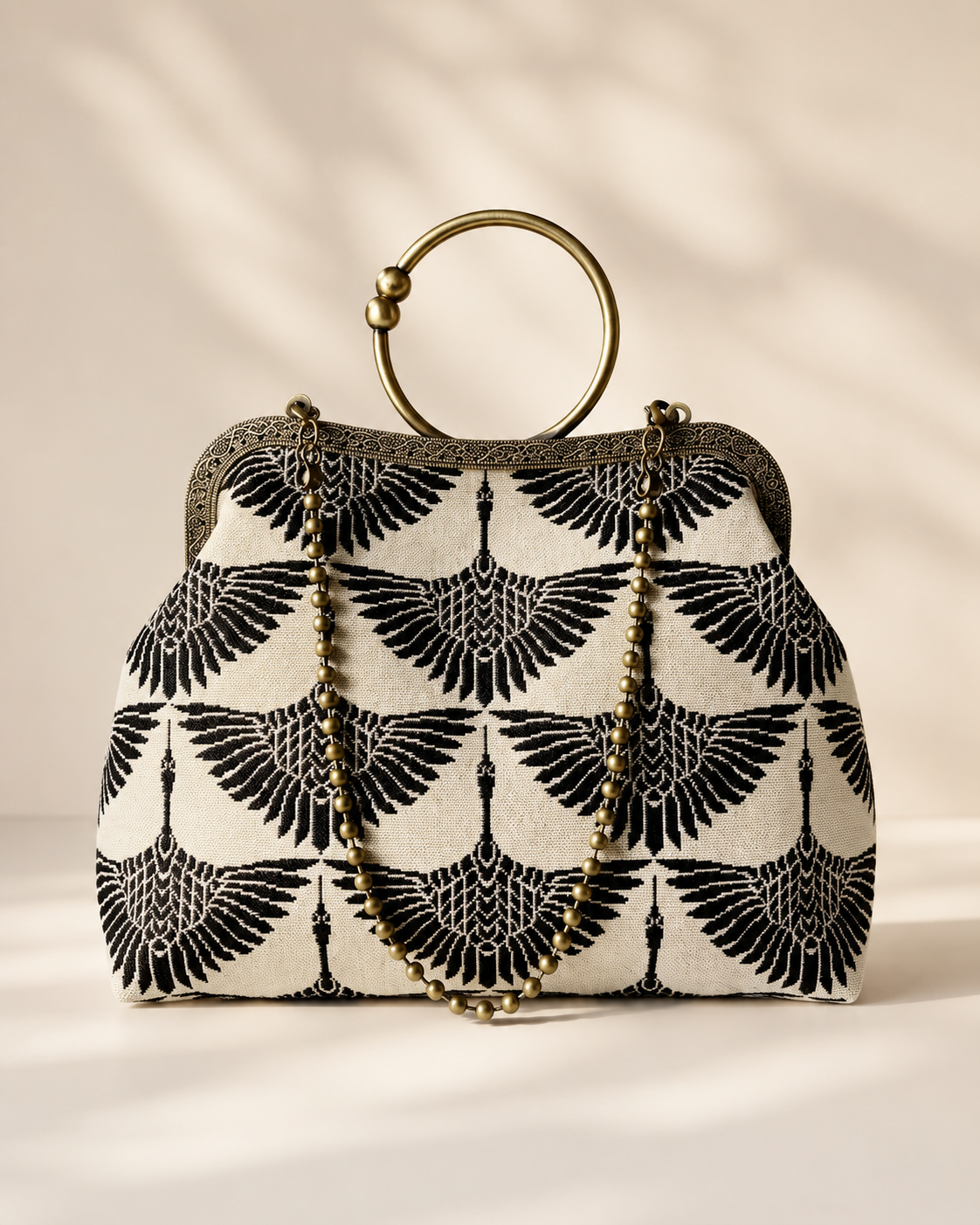 Crane Jacquard Clasp Handbag with Antique Brass O-Ring Handle