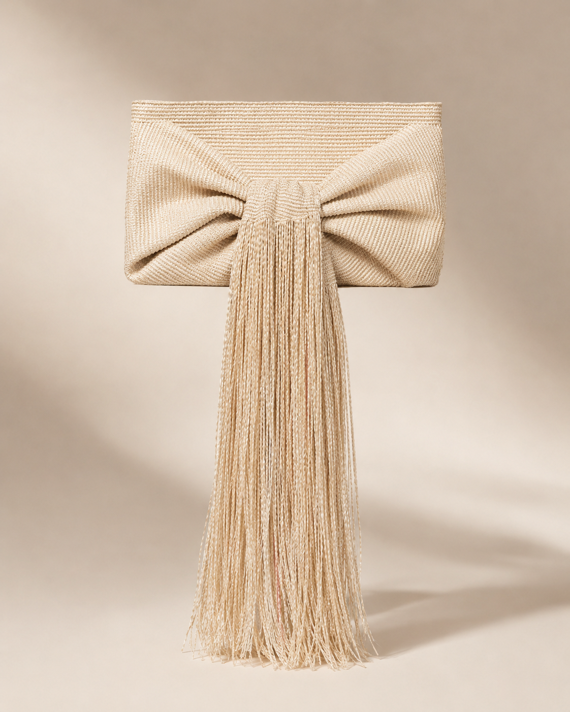 Woven Cotton Cord Bow Clutch with Dramatic Cascading Fringe