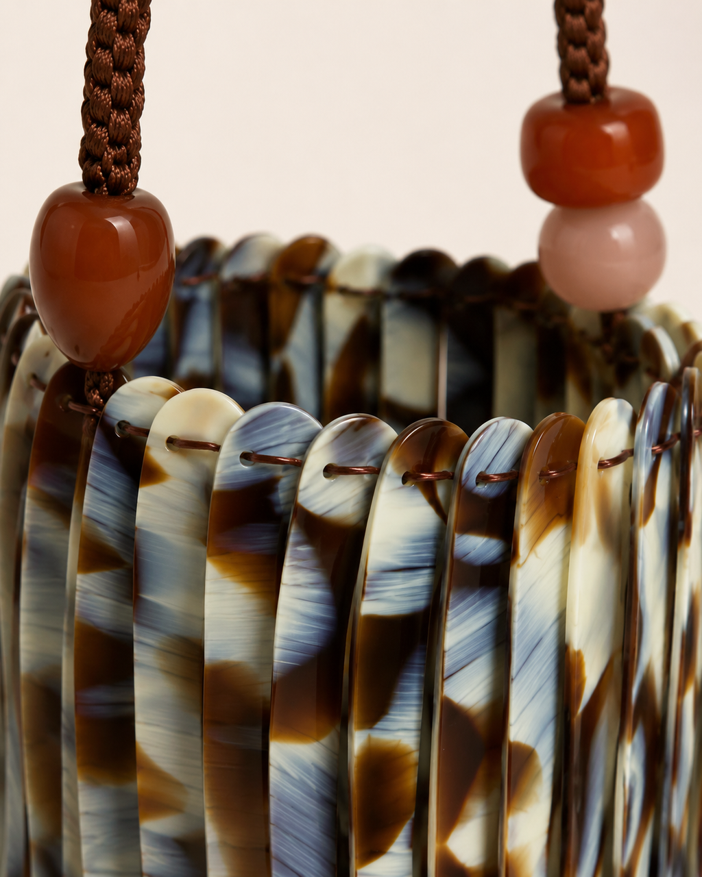 Avant-Garde Resin Link Bucket Bag with Braided Cord & Totemic Beads