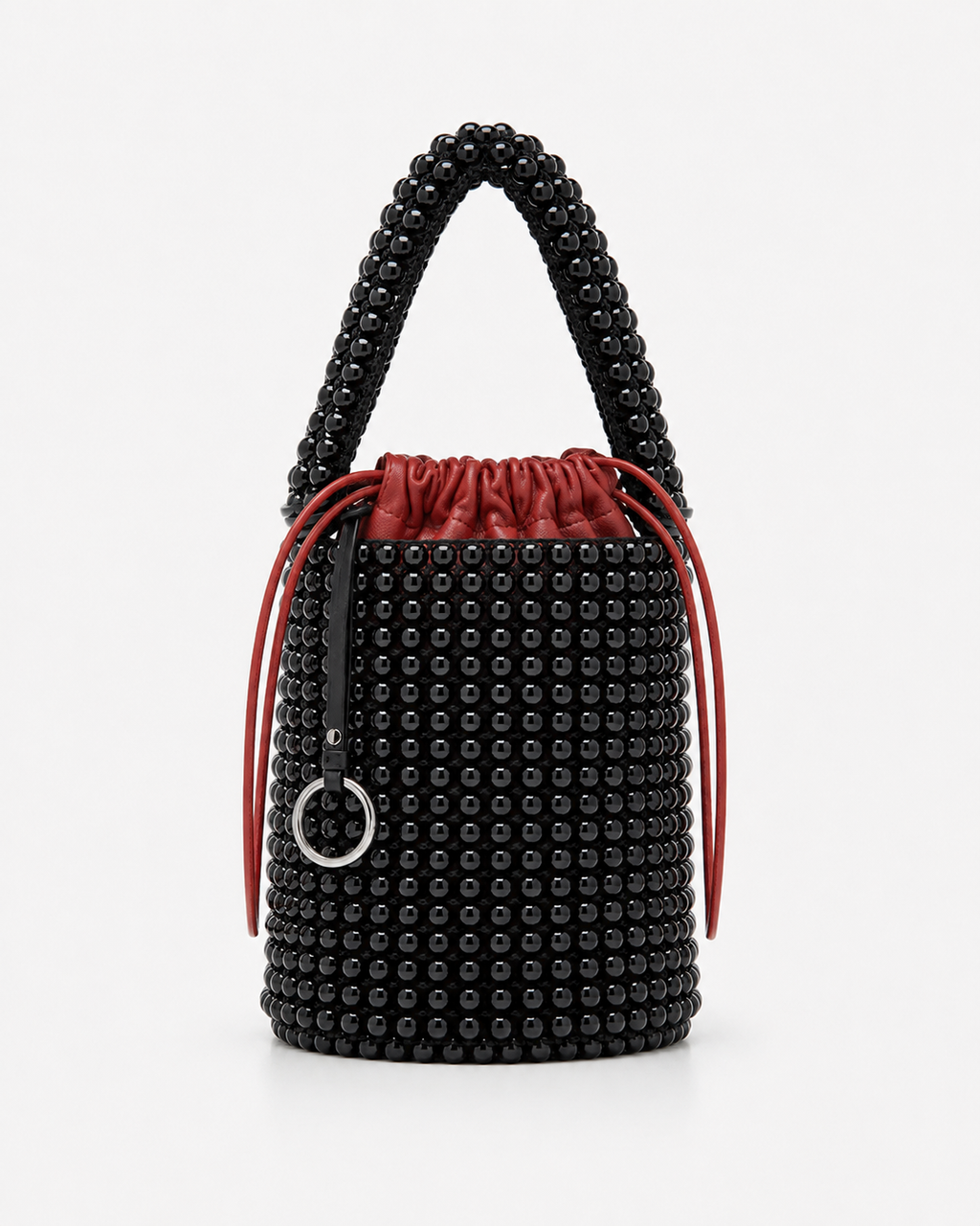Avant-Garde Beaded Bucket Bag with Contrast Red Leather Drawstring Pouch