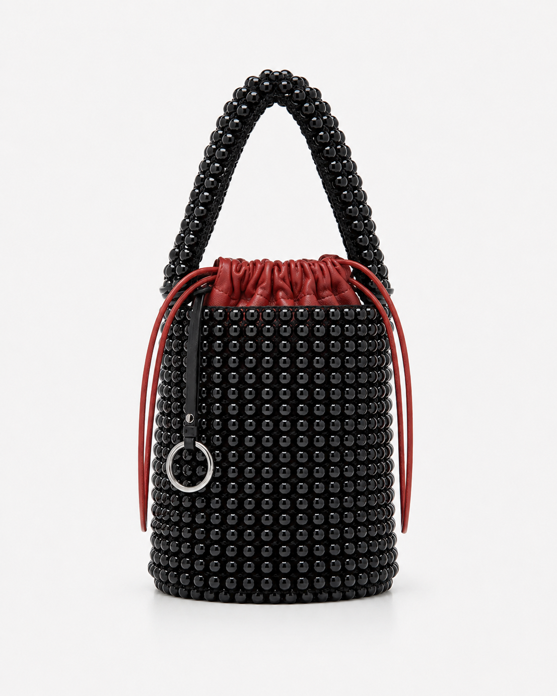 Avant-Garde Beaded Bucket Bag with Contrast Red Leather Drawstring Pouch